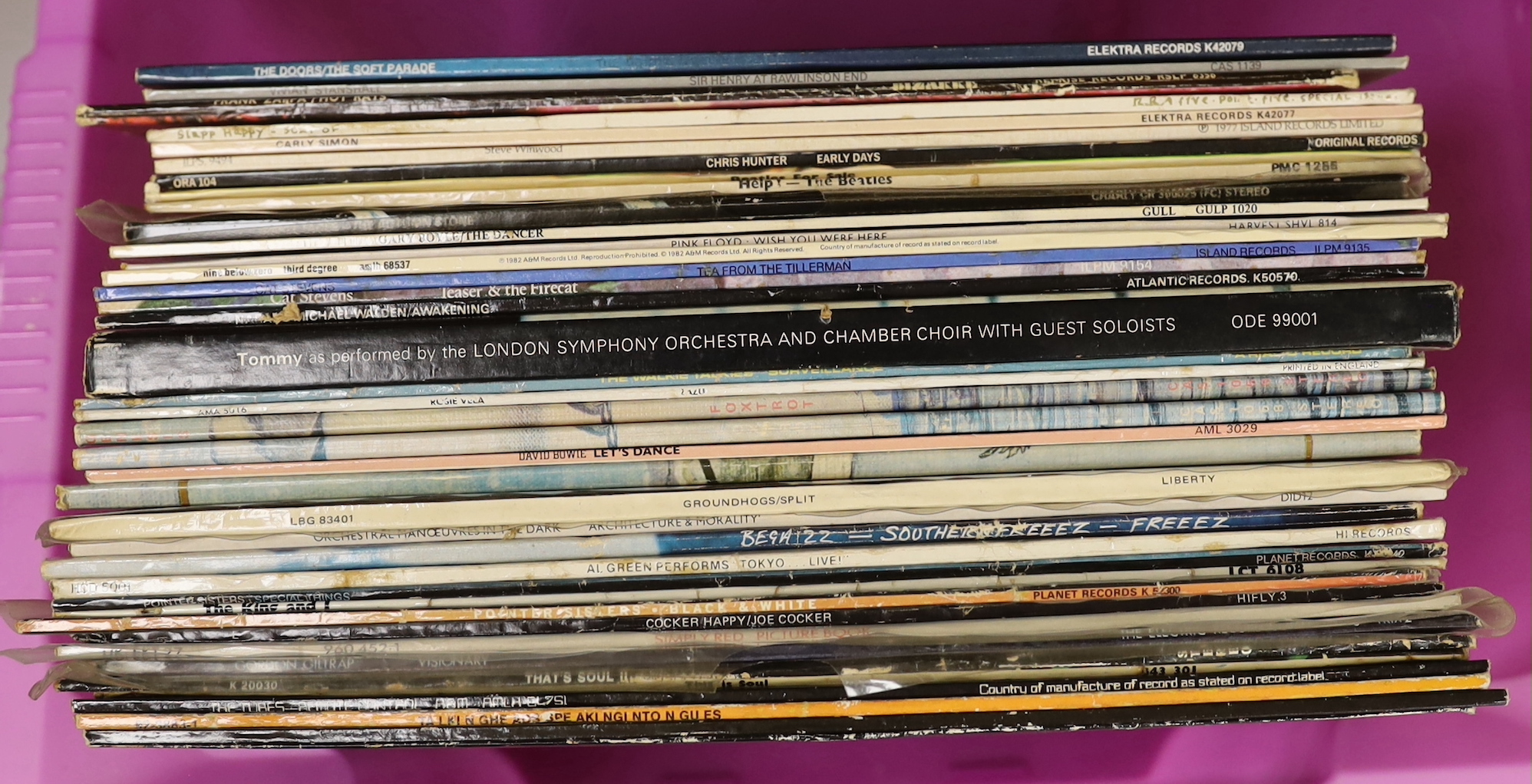 Thirty-eight LP record albums by artists including; The Doors, Carly Simon, Slap Happy, Frank Zappa, Steve Winwood, Chris Hunter, the Beatles, Pink Floyd, Cat Stevens, The Who, Genesis, etc. and to 12 inch singles by Are